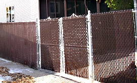 Chain Link Fence with Brown Slats