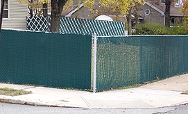 Chain Link Fence with Grass-Look Slats